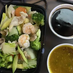 Really enjoyed this.  Steamed shrimp, chicken with vegetables.  The side sauces are curry and sesame.
