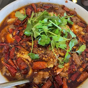 a bowl of stew with meat and vegetables