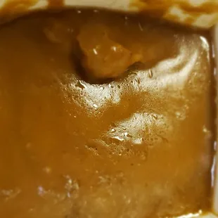 Thick brown gravy in the pork egg fu young.