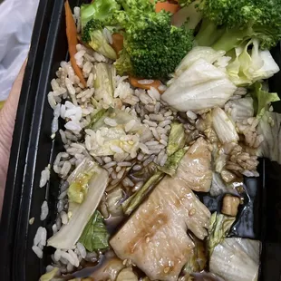 Chicken teriyaki, white rice and cold bland veggies .