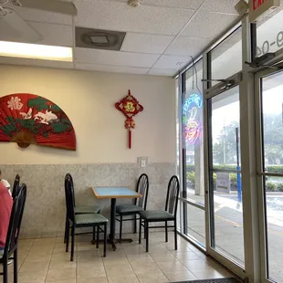 a table and chairs in a restaurant