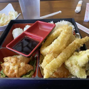 Chicken tempura?  2 pieces chicken looked big French fries. 1 each broccoli, sweet potato, zucchini, mushroom, onion!