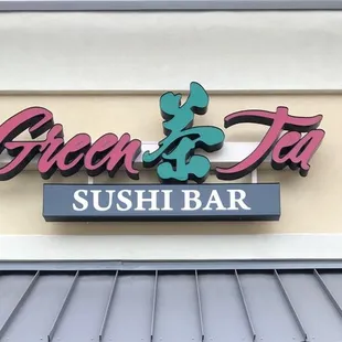 a sign for a sushi bar