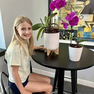 New pot on the left, old pot with the new orchid keiki on the right. We LOVE the selection of pots at Green Things!