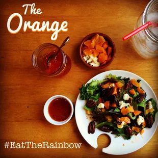 The Orange: Mixed Greens, Chopped Carrots, Dried Apricots, Gorgonzola Cheese, Glazed Pecans, and Pepper Jelly Vinaigrette
