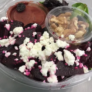 Red: mixed greens, marinated &amp; roasted beets, dried cherries, goat cheese, walnuts, honey balsamic vinaigrette.