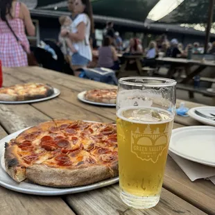 Pilsner and pepperoni pizza