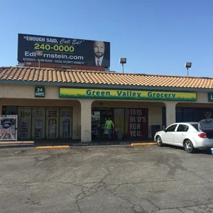 a car parked in front of the store