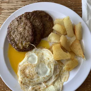 Food served sloppy eggs overcooked potatoes raw