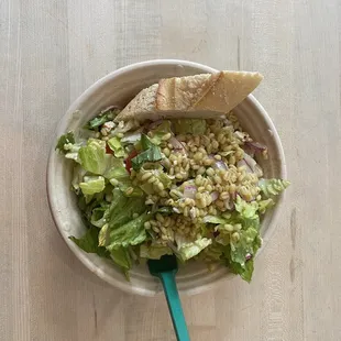 Same as always: green leaf lettuce, farro, bleu cheese, tomatoes, red onions, vinaigrette, chicken