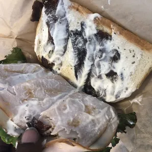 Burnt bacon on my Turkey Bacon Ranch Sandwich Lunch. Not worth the money.