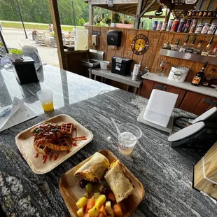 Ranchero Breakfast Burrito , Siracha Chicken &amp; Waffles , Gummybear Cocktail , and a Pineapple Mimosa