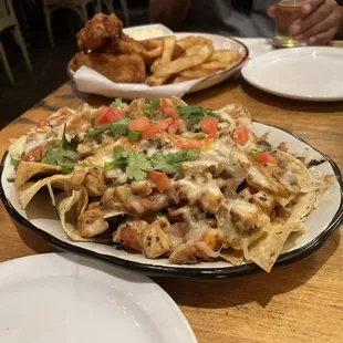 a plate of nachos and chips