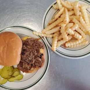 a plate of fries and a hamburger