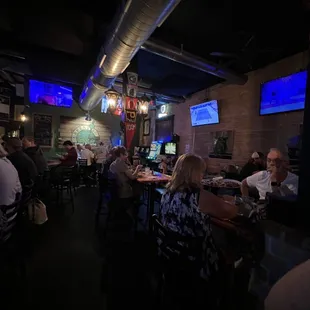 people sitting at a bar
