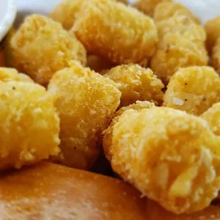 a plate of fried tater tots