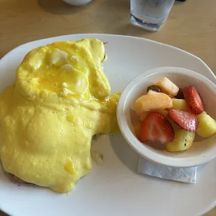 Biscuit Benedict with a side of fruit