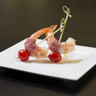 Prawn Skewer - prawn wrapped with prosciutto, skewered with cherry tomato