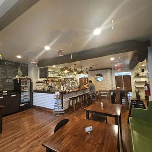 the interior of a greenhouse cafe