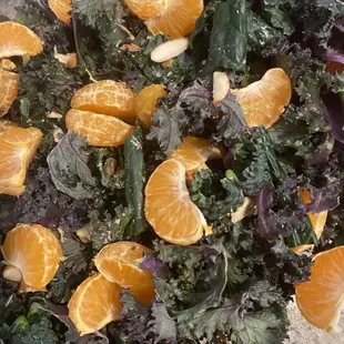 Citrus salad. A mix of Dino kale, purple and green kale
