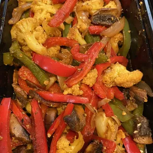 Veggie fajitas! 
Baby portobello, cauliflower, onion, red and green peppers