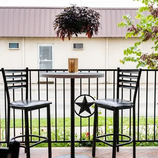 a table and chairs on a patio