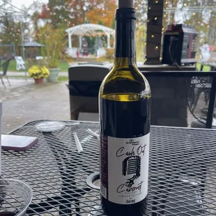 a bottle of wine on a table