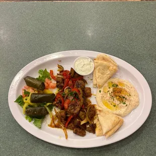 Lamb. Hummus.  Grape leaves