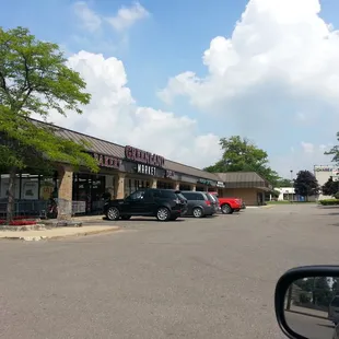 cars parked in front of the store