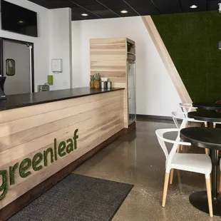 the interior of a modern coffee shop