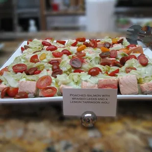 Poached salmon with braised leeks and a lemon tarragon aioli