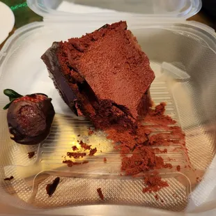 Red velvet cheesecake and chocolate covered strawberry.  My birthday gift compliments of the restaurant.  Delicious