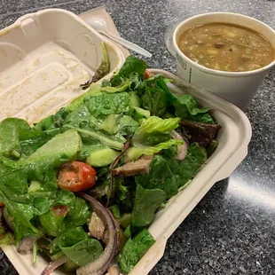 Half Steak Salad w/ cucumber + 1 pint of Gumbo...&amp; 1 quart of gumbo in the background