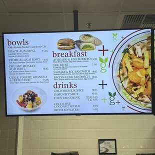 a menu on the wall of a restaurant