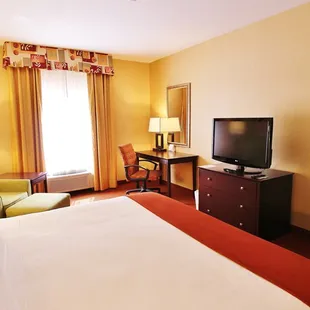 Enjoy a restful night's sleep in our comfortable King Rooms which feature a plush mattress, mini-fridge, Keurig and more.