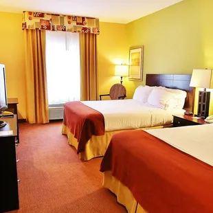 Perfect for families, our comfortable Queen Rooms feature plush mattresses, and standard amenities including a mini-fridge, Keurig and more.