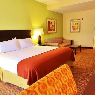 Stretch out, and enjoy the added space in our comfortable King Suite with a separate living area with a pull-out sofa sleeper.