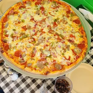 Meat Lover's Pizza With Peppers, Onions, and Extra Cheese