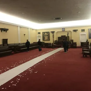 Lodge room setting up for wedding ceremony.