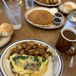 Spinach and ham omelette with potatoes for me. Husband had omelette as well. We shared the giant pancake.  It was all delicious.