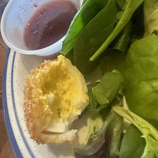 Fried deviled eggs with raspberry chipotle sauce