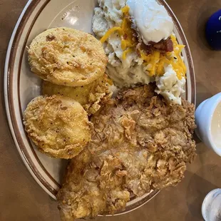 Chicken fried steak, fried green tomatoes, loaded mashed potatoes