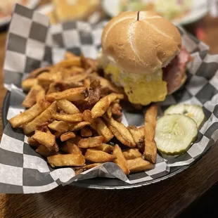 a plate of fries and a sandwich