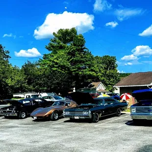 several cars parked in a parking lot
