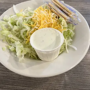 Salad-lettuce cheese and ranch.  Don't be fooled by the simplicity, it's delicious! Get the ranch!