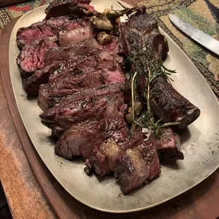 Finished them with a bit of butter, garlic and rosemary.  Accompanied with bread, salad and a couple of sides to share!