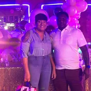 a man and a woman posing for a picture