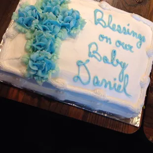 Baptism cake for our son . White cake with raspberry filling.