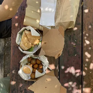 Grilled Bavette steak with port braised onion &amp; blue cheese cream in ciabatta, House made French fries and Crispy potato puffs