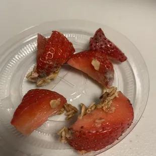 The strawberries and blueberries on top have gone moldy.